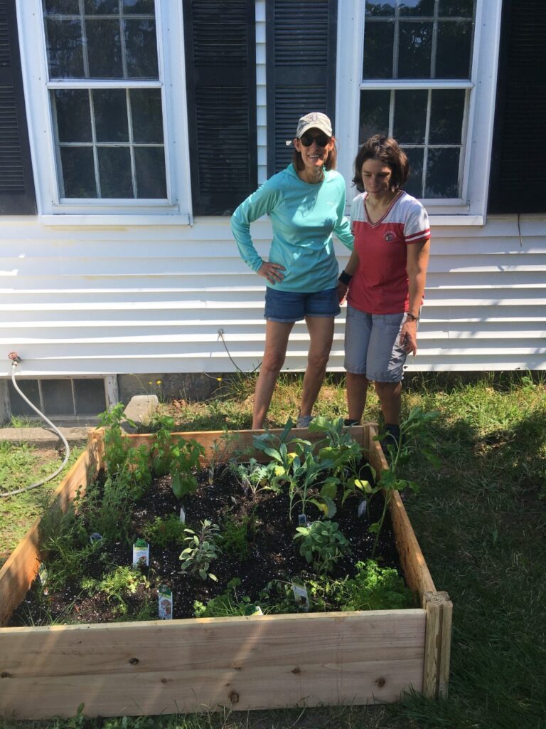 Volunteer Kendra and program participant Alex recently planted a raised garden bed together, and are looking forward to many more outings!